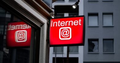 Internet LED signage beside building near buildings