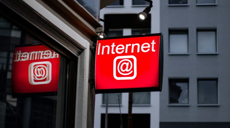 Internet LED signage beside building near buildings